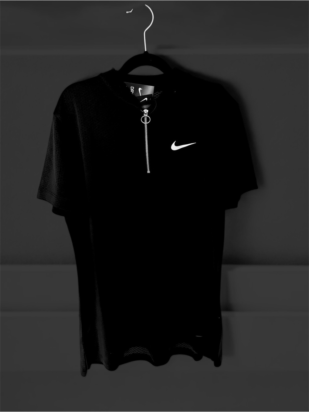 Nike Black Short-Sleeve Half-Zip Polo with White Swoosh